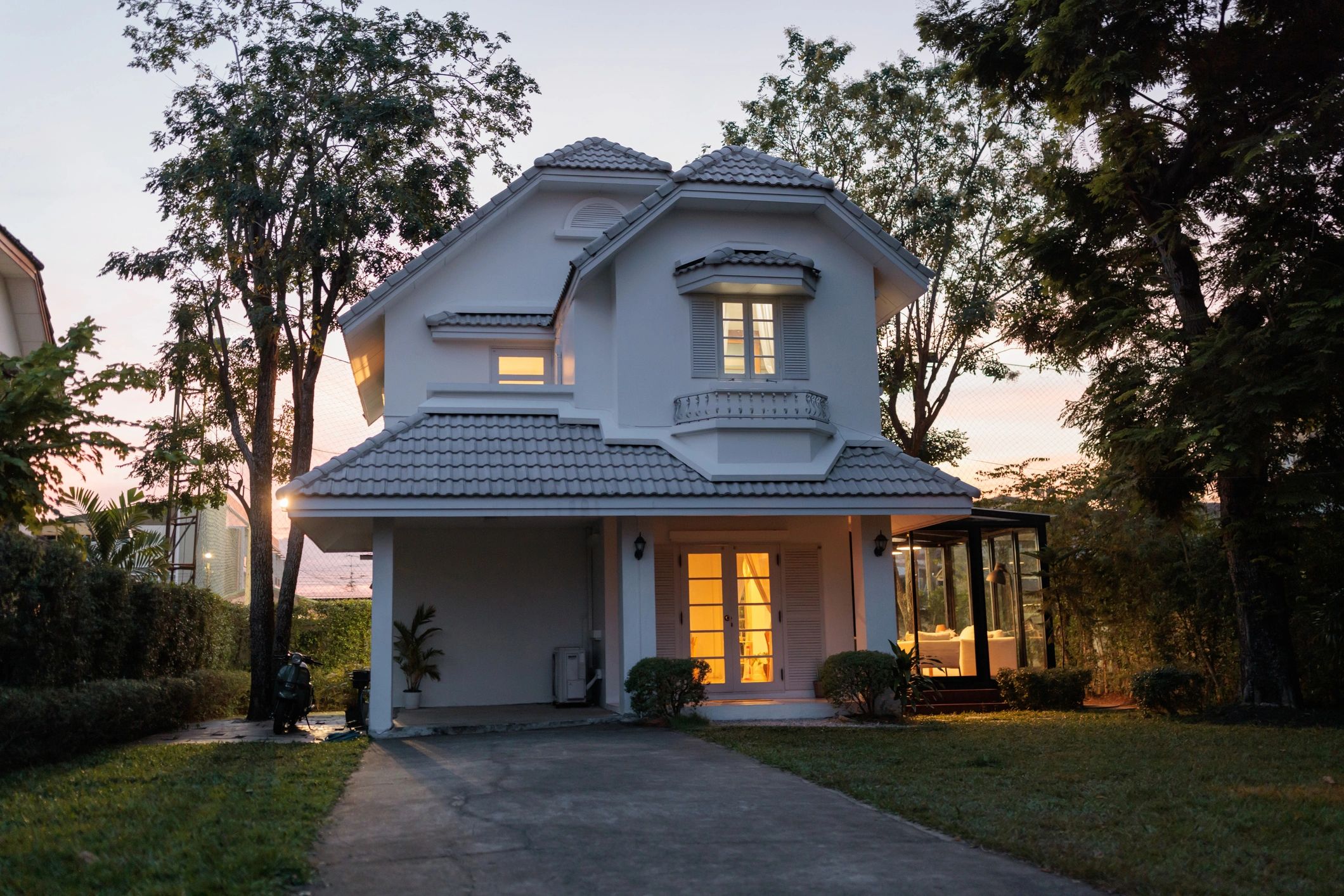 Residential roofline and exterior at dusk