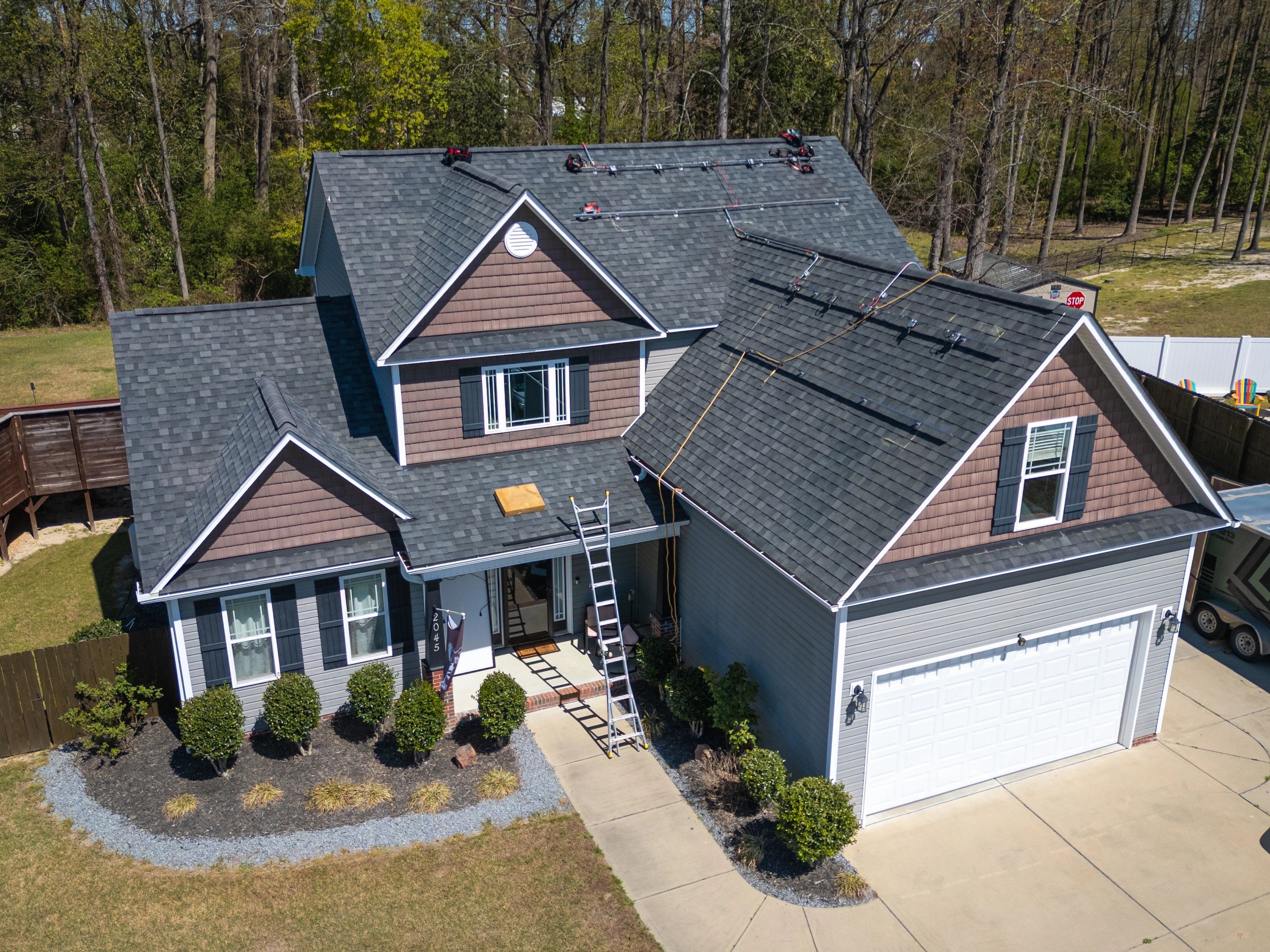 Residential roof and exterior representing exclusion work