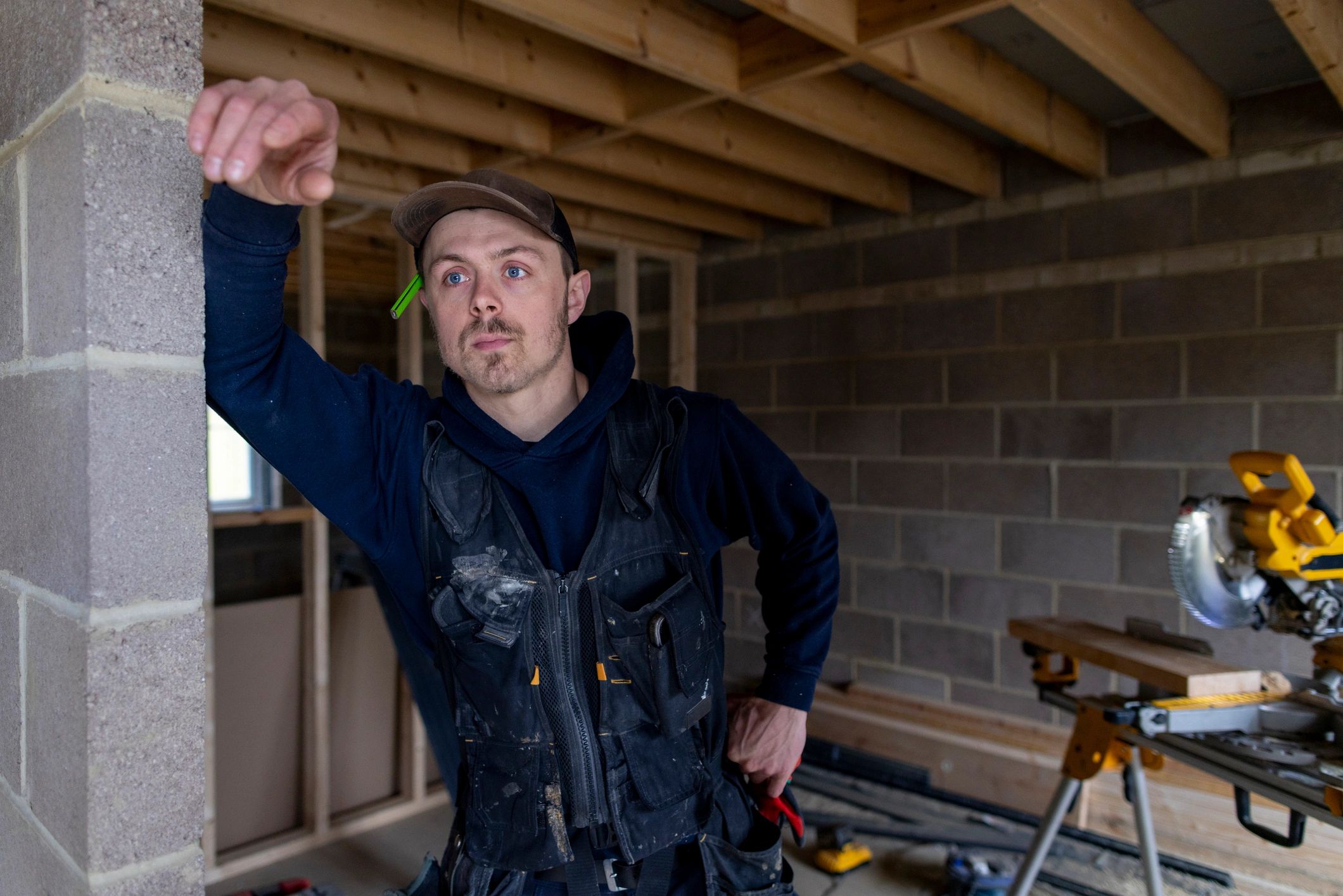 Professional technician representing commercial bat remediation services
